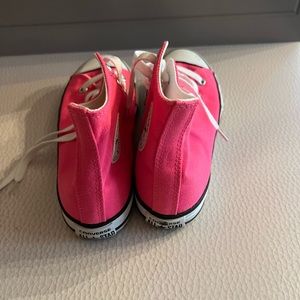 A lightly used hot pink converse for women